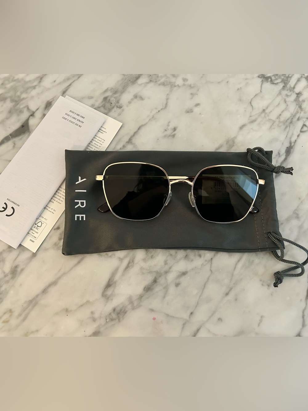 AIRE Women's Gold Frame Black Lens Sunglasses